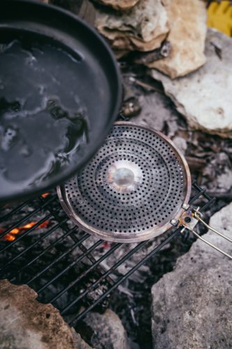 A heat diffuser is important to use when cooking on a pan or skillet over a camp fire. 